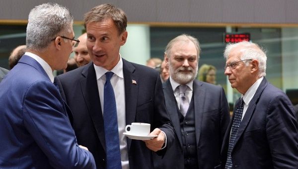 Malta's Foreign Minister Carmelo Abela talks with his British counterpart Jeremy Hunt during a EU foreign ministers meeting in Brussels, Belgium July 15, 2019. 