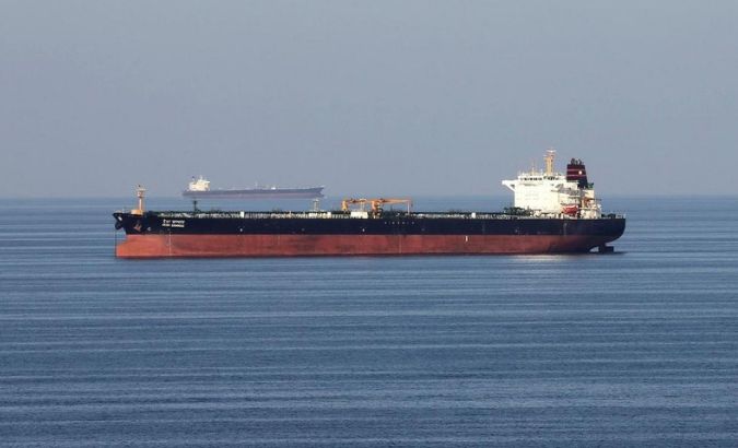 An unidentified oil tankers pass through the Strait of Hormuz.