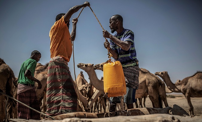 Men drawing water from a well in Somaliland, Somalia, July 25, 2019.