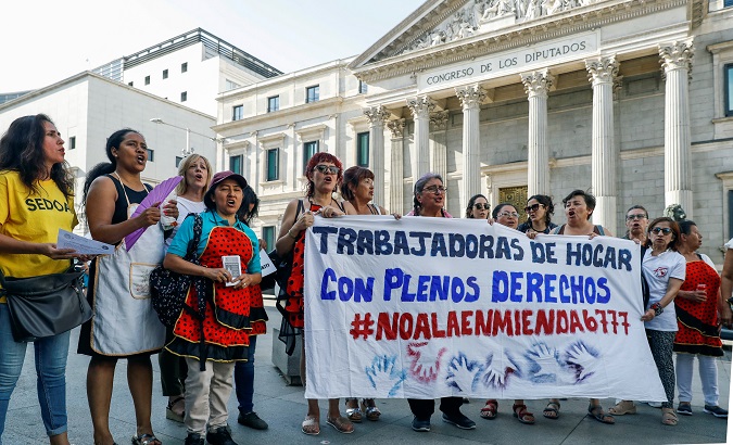 Domestic workers at a demonstration in front of the Congress in Madrid, Spain, June 27, 2018.