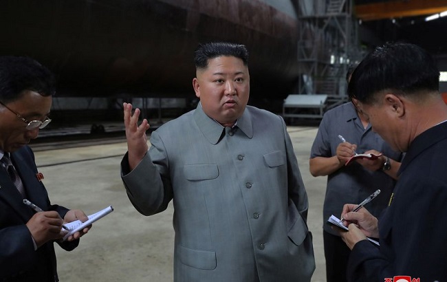 The photo provided by Korean Central News Agency (KCNA) on July 23, 2019 shows Kim Jong Un, top leader of the Democratic People's Republic of Korea (DPRK), inspecting a newly built submarine