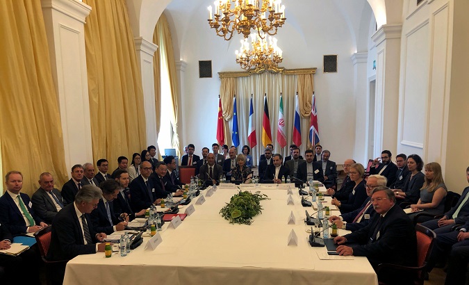 Iran's top nuclear negotiator Abbas Araqchi and EEAS Secretary General Helga Schmid attend a meeting of the JCPOA Joint Commission in Vienna, Austria July 28, 2019.