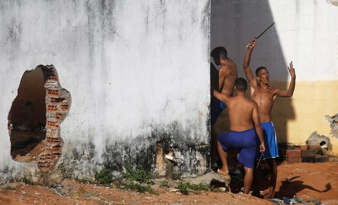 A riot in a Brazilian prison killed 52 inmates, decapitated 16.