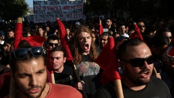 Students shout slogans as they take part in a rally against the abolishment of academic sanctuary in Athens, Greece July 23, 2019. 