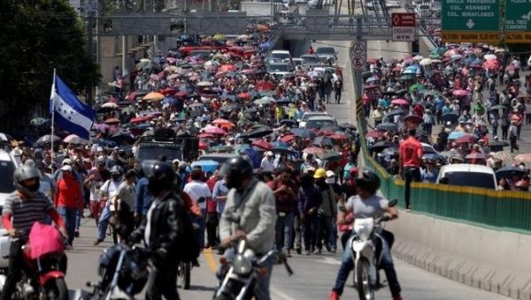 Demonstrators march to protest against government plans to privatize healthcare and education, in Tegucigalpa, Honduras April 30, 2019. 