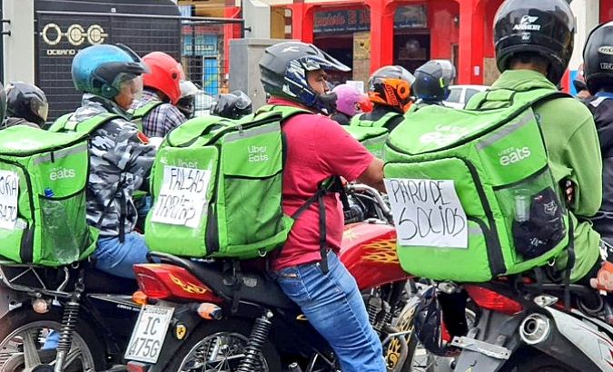 Uber Eats' workers protest the current working conditions and a recent cut in payment rates.