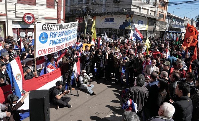 Paraguayans demonstrated against the country's president and vice president for alleged corruption.
