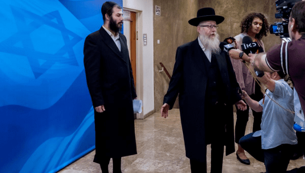 Israeli Minister Yaakov Litzman to be charged for shielding a pedophile former principle from being sent back to Australia.