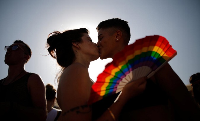 Revellers take part in a gay pride parade in Tel Aviv, Israel June 8, 2018.