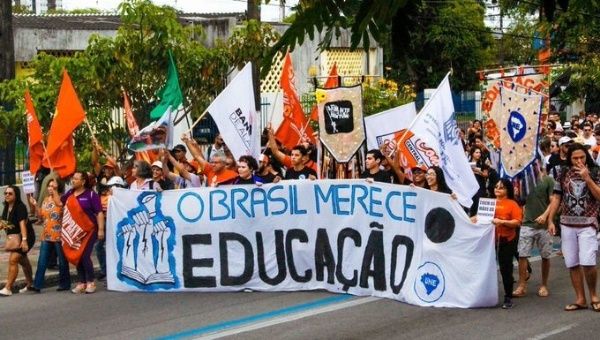 Students take to the streets in Maceio, state of Alagoas, Brazil. The banner reads, 