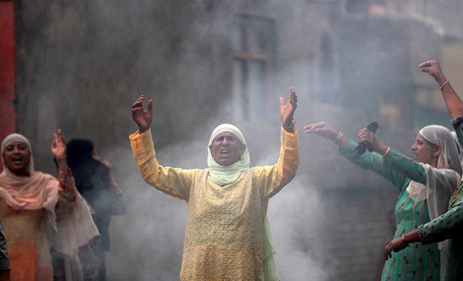 Women shout slogans during a protest following restrictions after the government scrapped the special constitutional status for Kashmir, in Srinagar August 14, 2019.