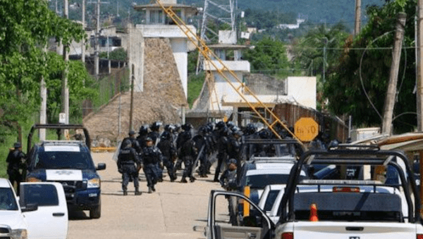 Riot police enter a prison after a riot broke out at the maximum security wing in Acapulco, Mexico, July 6, 2017.