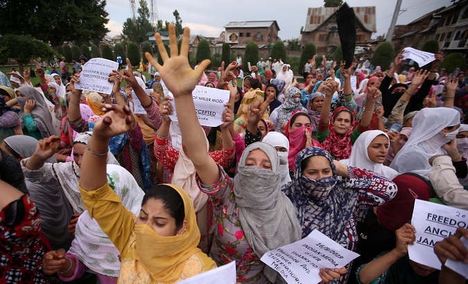 Kashmiri women shout slogans at a protest after Friday prayers during restrictions after the Indian government scrapped the special constitutional status for Kashmir, in Srinagar August 16, 2019.
