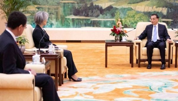 Chinese Premier Li Keqiang (R) meets South Korean Foreign Minister Kang Kyung-wha (C) and Japanese Foreign Minister Taro Kono (L) at the Great Hall of the People (GHOP) in Beijing, China, 22 August 2019. 