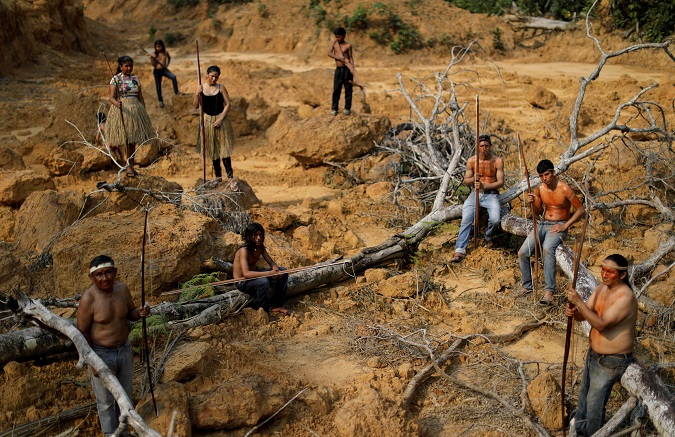 Indigenous people from the Mura tribe show a deforested area in unmarked indigenous lands inside the Amazon rainforest near Humaita, Amazonas State, Brazil August 20, 2019. Picture taken August 20, 2019.