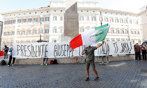Five-Star Movement activists demonstrate ahead of a speech by Prime Minister Giuseppe Conte at the senate on the ongoing government crisis in Rome.