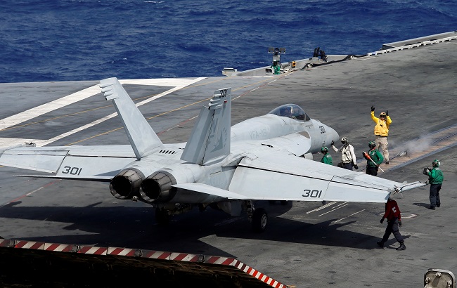 An F/A-18 Super Hornet prepares for take-off, onboard the USS Ronald Reagan, in the South China Sea September 30, 2017.