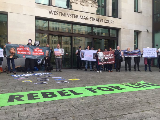 Protesters outside Julian Assange's court hearing in London