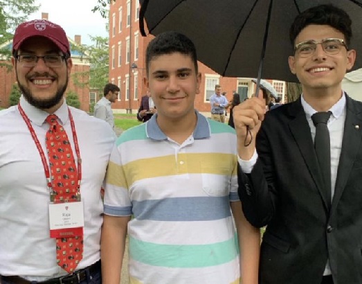 Palestinian student Ismail Ajjwali (middle) finally made it to Harvard University after being deported by the U.S.