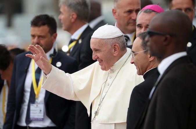 Pope Francis greets faithful as he arrives at the Cathedral of Our Lady of the Immaculate Conception in Maputo, Mozambique, September 5, 2019.