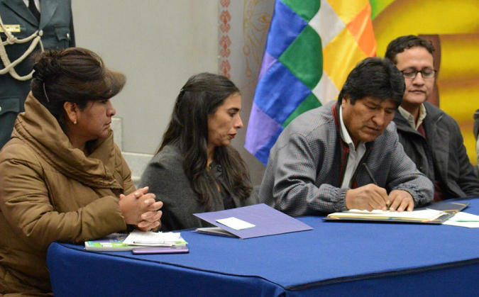 Bolivian President Evo Morales signs the Cancer Law into effect, Sept. 5, 2019
