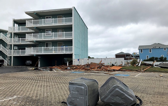 Parts of air conditioning systems lie in the parking lot of a condominium complex that was damaged by Hurricane Dorian in Nags Head, North Carolina, U.S. September 6, 2019.