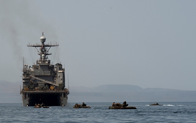 Amphibious Assault Vehicles cruise towards the well deck of the amphibious dock landing ship USS Harpers Ferry (LSD 49), in Gulf of Aden, in this picture taken August 15, 2019 and released by U.S. Air Force on September 3, 2019.