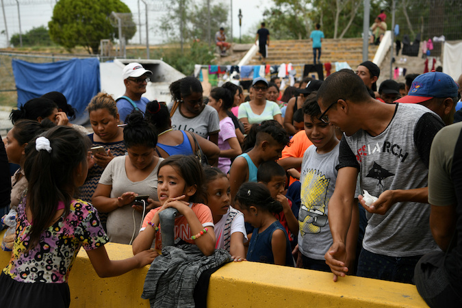 Migrants at the Gateway International Bridge in Matamoros, Tamaulipas, Mexico, August 24, 2019.