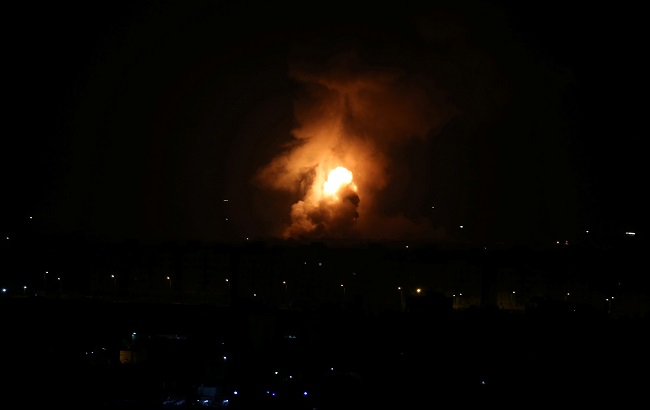 Flame and smoke are seen during an Israeli air strike in the central Gaza Strip September 11, 2019.