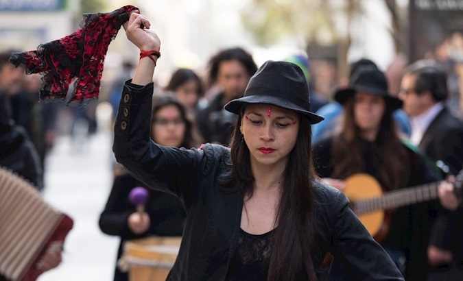 March of women dressed in black in memory of the victims of the dictatorship in Santiago, Chile, Sep. 10, 2019.