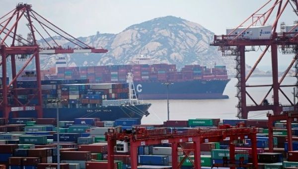 Containers are seen at the Yangshan Deep Water Port in Shanghai, China August 6, 2019. 