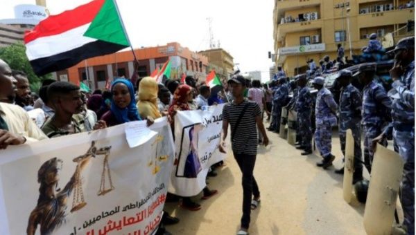 Sudanese demonstrators attend a protest calling for the appointment of top judicial officials and justice for killed demonstrators, outside the presidential palace in Khartoum, Sudan, September 12, 2019.