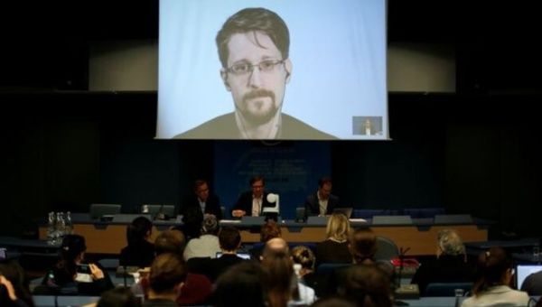  Edward Snowden speaks via video link as he takes part in a round table on the protection of whistleblowers at the Council of Europe in Strasbourg, France, March 15, 2019.