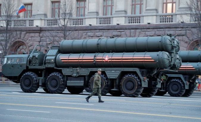 A Russian serviceman walks past S-400 missile air defence systems in Tverskaya Street before a rehearsal for the Victory Day parade.