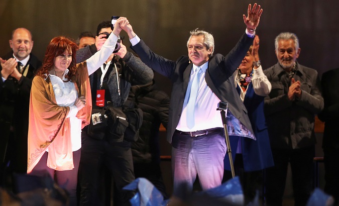 Alberto Fernandez (R) and Cristina Fernandez (L) at their closing campaign rally ahead of primary elections, in Rosario, Argentina, Aug. 7, 2019.