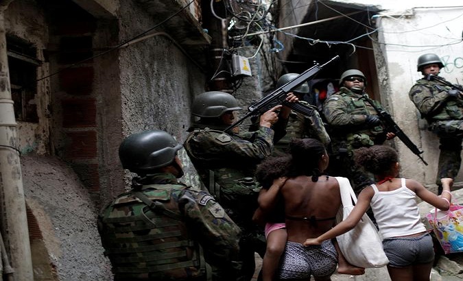 Brazilian police during drug raid in a favela.