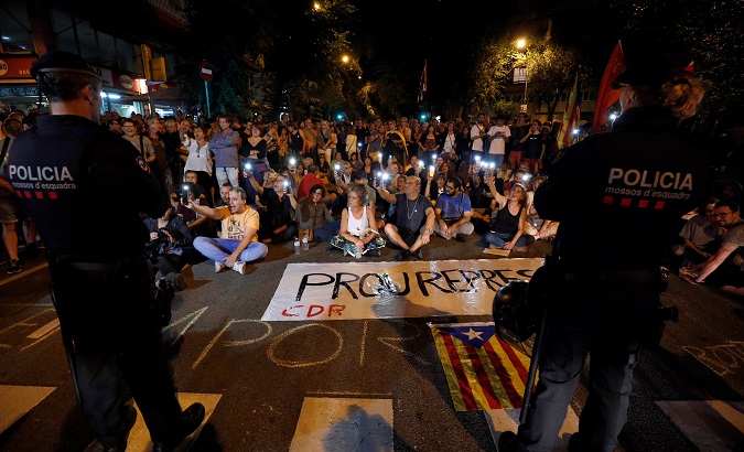 Catalonia's pro-independence rally in Barcelona, Spain, Sep. 23, 2019. Banner reads, 'No more repression'.
