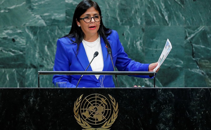 Venezuela's Vice President Delcy Rodriguez shows pictures as she addresses the 74th session of the United Nations General Assembly at U.N. headquarters in New York City, New York, U.S., September 27, 2019