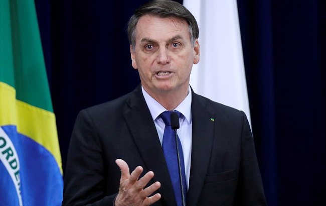 Brazil's President Jair Bolsonaro speaks during a signing ceremony of a presidential decree providing federal organisations with free of charge publications by National Press, in Brasilia, Brazil September 30, 2019.