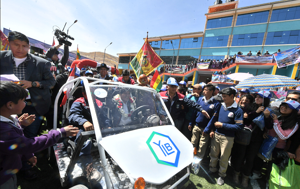 Morales driving Bolivia's first electric car, manufactured in the country