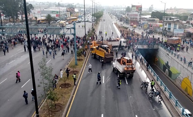 Transport drivers block roads in Ecuadorean capital Quito, Oct. 3, 2019.