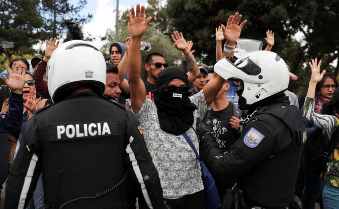 Demonstrators clash with riot police during protests after Ecuador's President Lenin Moreno's government ended fuel subsidies, Quito, Ecuador October 4, 2019.