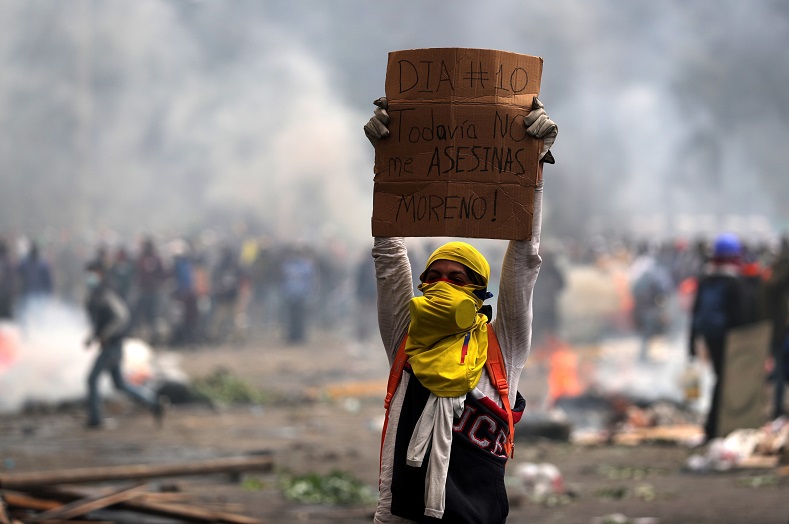 Student holds sign reading, '10th day, [President] Moreno, you still can't kill me', Quito, Ecuador, October 11, 2019.