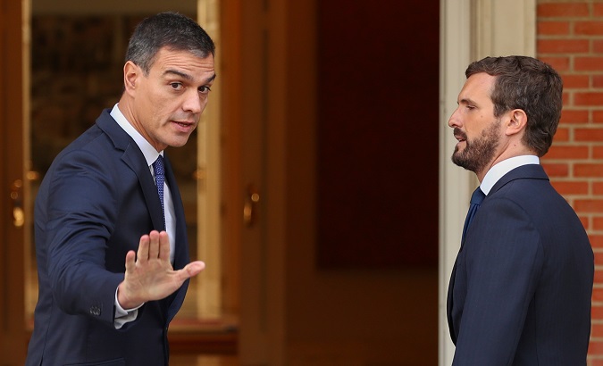 Spain's acting Prime Minister Pedro Sanchez meets opposition leader Pablo Casado at the Moncloa Palace in Madrid.