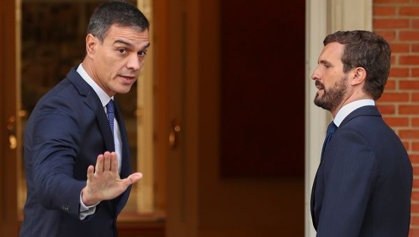 Spain's acting Prime Minister Pedro Sanchez meets opposition leader Pablo Casado at the Moncloa Palace in Madrid.
