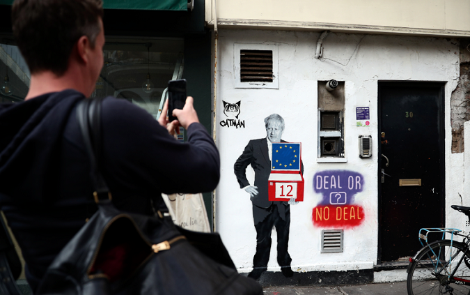 Mural depicting Britain's Prime Minister Boris Johnson on the side of a residential building in London, Britain, October 15, 2019