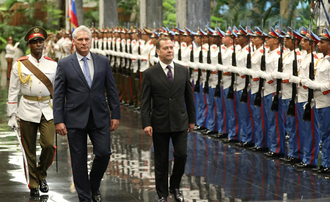 Cuba's President Miguel Diaz-Canel and Russia's Prime Minister Dmitry Medvedev during a ceremony at the Revolution Palace in Havana, Cuba, October 3, 2019.