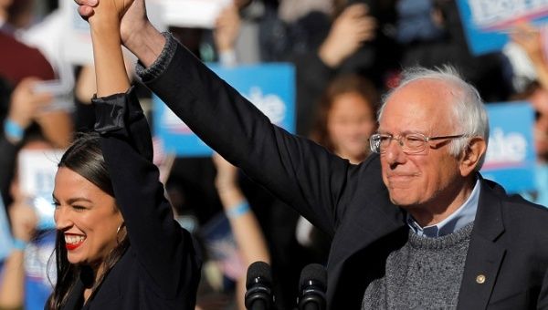U.S. Rep. Alexandria Ocasio-Cortez (NY) introduces Democratic 2020 U.S. presidential candidate and U.S. Senator Bernie Sanders during the 