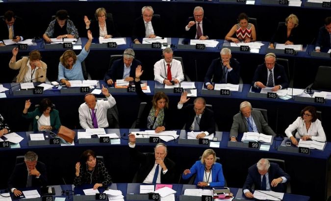 Members of the European Parliament take part in a vote on the situation in Hungary during a voting session at the European Parliament in Strasbourg, France, September 12, 2018.