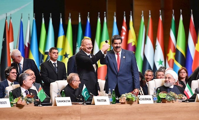 Venezuela's President Nicolas Maduro (R) and Azerbaijan's President Ilham Aliyev (L) at the 18th Summit of the Non-Aligned Movement in Baki, Azerbaijan, Oct. 25, 2019.